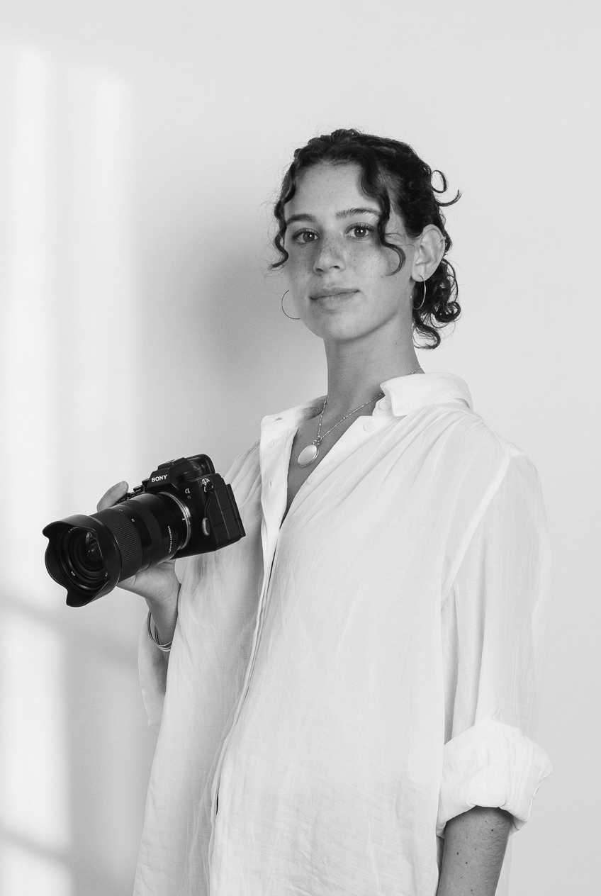 Valentina holding her camera